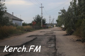 Новости » Общество: На горпляже еще один участок дороги подготовили к ямочному ремонту